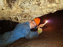 Caving by Candle light